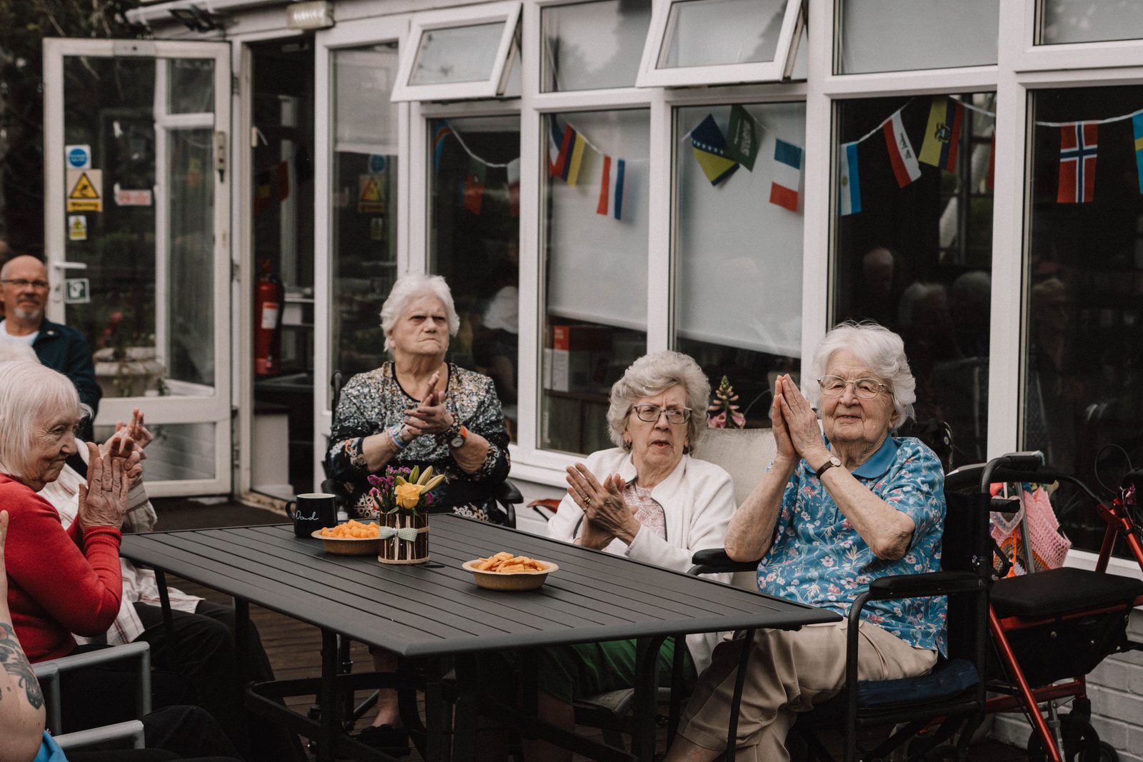Residents applauding a performance
